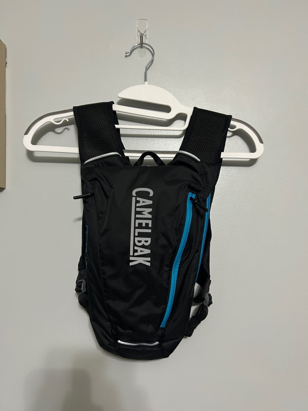 CamelBak Black Hydration Pack with Blue Zipper Accents